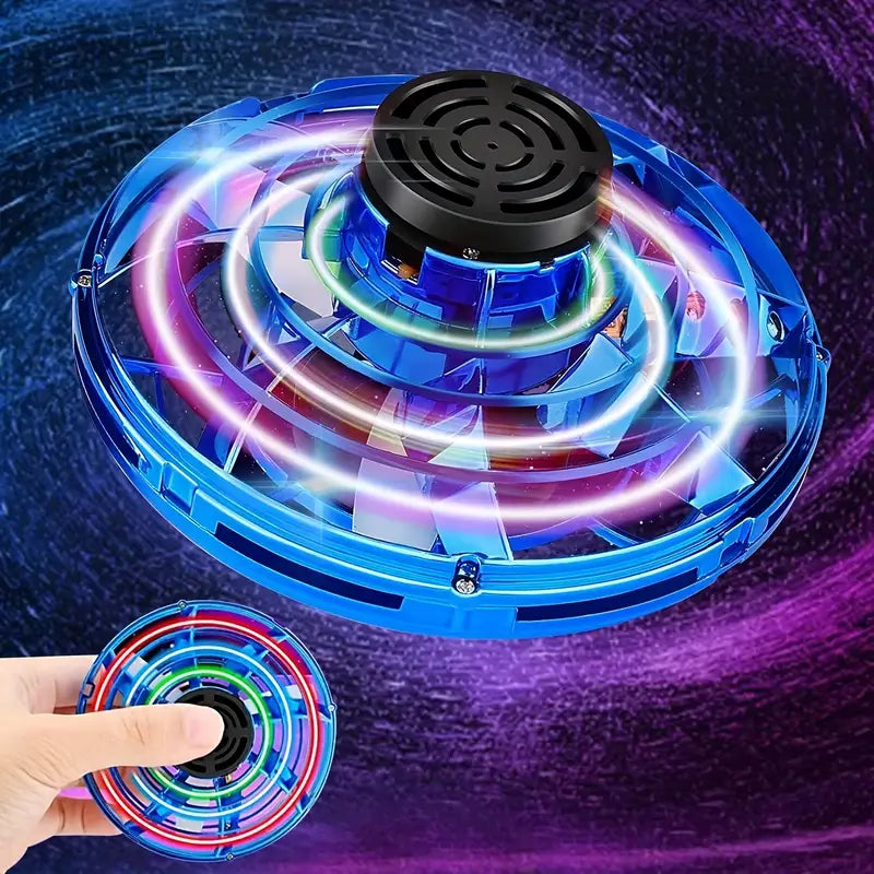 Hand launching a glowing LED flying spinner toy into the air